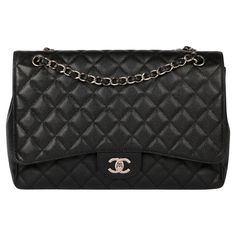 Chanel Black Quilted Caviar Leather Maxi Classic Single Flap Bag Brand- Chanel Model- Maxi Classic Single Flap Bag Product Type- Crossbody, Shoulder Serial Number- 13****** Age- Circa 2009 Colour- Black Hardware- Silver Material(s)- Caviar Leather Height- 24cm Width- 35cm Depth- 10cm Strap Drop- Single: 48cm Double: 27cm Interior- Black Leather Closure- Turn Lock Country of Origin- Italy Condition Rating- Excellent Exterior Condition- The exterior is in excellent condition with light signs of us Number 13, Chanel Model, Black Quilt, Chanel Black, Black Hardware, Flap Bag, Fashion Handbags, Black Leather, Chanel