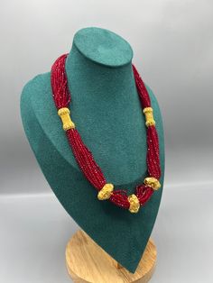 Introducing the exquisite "Nepalese Katar Gedi Hydro Potey Necklace" - a masterpiece inspired by the rich cultural heritage of Nepal. Handcrafted with love and skill by talented artisans, this necklace embodies the essence of Nepalese craftsmanship. Our company offers expedited Next-Day Delivery Services within the United Kingdom, ensuring prompt and efficient transportation of goods.  Additionally, we strive to extend our shipping capabilities to cater to customers worldwide, aiming to provide Handmade Temple Jewelry Beaded Necklaces For Festivals, Traditional Gold Bridal Necklace With Large Beads, Traditional Polished Beads Necklace For Festivals, Traditional Large Beads Necklace For Festive Occasions, Traditional Polished Bead Necklaces For Festivals, Traditional Green Beaded Necklace With Gold Beads, Traditional Green Faceted Beaded Necklace, Traditional Green Faceted Beaded Necklaces, Festive Handmade Ceremonial Beaded Necklace