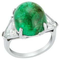 Cabochon Colombian Emerald & Diamond Three Stone Ring set in platinum AGL Certified Emerald Weight: 12.30 cts Ring Size: 6 Re-sizable to any size free of charge Elegant White Gold Cabochon Emerald Ring, Elegant White Gold Emerald Cabochon Ring, Formal Polished Platinum Emerald Ring, Formal Platinum Emerald Ring With Polished Finish, Platinum Oval Emerald Ring With 17 Jewels, Oval Platinum Emerald Ring With 17 Jewels, Modern Cabochon Emerald Ring For Formal Occasions, Luxury Silver Polished Cabochons, Silver Cabochons For Formal Occasions