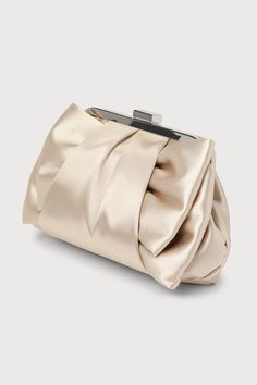 Elegant Plus OneThis glossy satin clutch is ready to RSVP in style with its flexible exterior, complete with a folded bow-like detail that lends an ultra-chic aesthetic. Open the silver top clasp closure to reveal a lined interior for your most precious essentials. Detachable silver chain strap. Lined. Bag Measures 8. 5" Wide, 6. 5" Tall, And 2" Deep (Relaxed). 47. 5" Detachable Chain Strap. Strap Has A Drop Measurement Of 23. 5". Shell: 100% Polyester. Imported. Lulus | Something Special Champa Chic Formal Evening Bag With Bow, Champagne Clutch Bag For Evening, Chic Evening Bag For Dinner, Elegant Satin Finish Evening Bag For Party, Champagne Clutch Evening Bag For Formal Events, Satin Evening Bag With Satin Lining For Parties, Elegant Evening Bag With Bow, Chic Bow Evening Bag For Party, Elegant Bags With Bow For Events