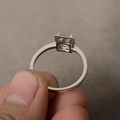 This is a gorgeous handmade creation. Its beauty is its simplicity & Elegance. The 5*5mm square cut natural aquamarine (March birthstone) is solid sterling silver and with rhodium plated. All item is sent in a beautiful gift box You can realize more lovely stuff clicking the link https://www.etsy.com/shop/knightjewelry?refshopsection_shophome_leftnav Please leave the correct address and you phone number for delivering successfully. Silver Princess Cut Birthstone Promise Ring, Silver Princess Cut Topaz Promise Ring, Silver Birthstone Ring With Asscher Cut For Anniversary, Rectangular Silver Emerald Ring For Wedding, Sterling Silver Diamond Ring With Radiant Cut, Silver Asscher Cut Topaz Ring For Anniversary, White Gold Asscher Cut Birthstone Ring, Silver Moissanite Emerald Ring With Asscher Cut, White Gold Topaz Ring With Princess Cut