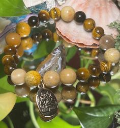 Tigers eye Fossil coral Jade 24k filled Buddha charm Tigers Eye Bracelet, Chakra Root, Tiger Eye Bracelet, Fossil Coral, Sacral Chakra, Jade Bracelet, Eye Bracelet, Root Chakra, Tigers Eye