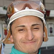 a man wearing a helmet and goggles on top of his head