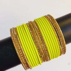 Brand New Beautiful Neon Green & Gold, Fusion Bangles Set Indian Pakistani Bracelets, Includes 4 Thick Cubic Zirconia Bangles, Which Can Be Worn Separately As Well, Size Small 2.4 Size Which Fits Small Wrists. Check The Last Picture For Indian Bangles Size Reference Great For Wedding, Haldi, Sangeet, Indian Pakistani Weddings, Events, Social Gathering Or Festivals. More Colors Available, Check Out Other Listings. Bundle To Get Huge Discount. Free Gift Shipping In 24 Hours Perfect Neon Green For Yellow Bracelets For Party And Festivals, Green Metal Bracelets For Festive Occasions, Adjustable Metal Bangle For Celebration, Adjustable Yellow Bangle For Festivals, Adjustable Yellow Bangle For Festive Occasions, Adjustable Green Bangle For Party, Festive Adjustable Yellow Bangle, Adjustable Yellow Jewelry For Festive Occasion, Adjustable Green Bangle For Celebration