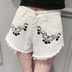 This is a simple printed shorts,it is very comfortable jeans fabric,clothes pants is very loose,plus beautiful tassel,you will feel cool in summer,simple pattern match clothes look very beautiful,if you like it,just get one.Material:DenimColor:White,BlueSize:S,M,L,XLWaistline:High WaistDecoration:TasselPocket:Side Pockets and Back PocketsPattern:PrintFit Type:LooseClose Type: ZipperOccasion:Street,BeachSeason:SummerThe accessories are not included. Cotton Jean Shorts For Spring Beach Outing, Cotton Jean Shorts For Beach Spring Season, Cotton Jean Shorts For Beach In Spring, White Bohemian Cotton Shorts, Cotton Shorts With Frayed Hem For Vacation, White Bottoms With Tassels For Spring, Casual Embroidered Cutoff Shorts, Trendy Cutoff Shorts With Floral Embroidery, Embroidered Cutoff Shorts For Summer