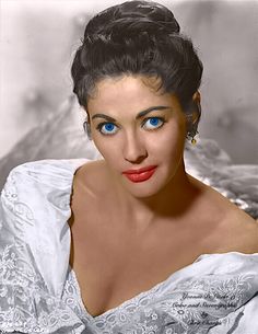 an old photo of a woman with blue eyes