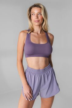 Our Synergy X Bra is designed for the ultimate comfort and style while offering a sporty addition to your wardrobe. This ribbed tank offers medium compression to flatter your figure. Seamless Bra, Womens Bras, Ribbed Tank, Wide Straps, Ribbed Fabric, Violet, Bra, Wardrobe