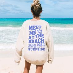 Meet me at the beach in our retro coconut girl sweatshirt. It is a trendy oversized crewneck sweatshirt and is sure to be a favorite. It's comfortable, warm, and soft. This beachy aesthetic sweatshirt has a minimalist look that goes with almost everything, whether you are just lounging around at home or out and about, get in that beach state of mind. ♥ Our unisex heavy blend crewneck sweatshirt is pure comfort. These garments are made from polyester and cotton. This combination helps designs com Oversized Graphic Print Sweatshirt For Weekend, Trendy Letter Print Sweatshirt For Beach, Oversized Letter Print Sweatshirt For Summer, Oversized Hoodie For Beach Season Streetwear, Oversized Trendy Sweatshirt For Beach Season, Oversized Crew Sweatshirt For Summer, Trendy Oversized Sweatshirt For Beach Season, Beach Season Sweatshirt With Letter Print, Summer Vacation Hoodie With Crew Neck