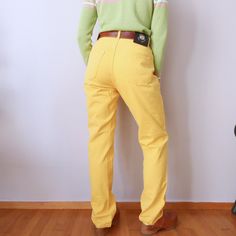 Vintage banana yellow Versace denim basic pants nineties aesthetics capsule trousers size S/M Excellent vintage condition! Designer: Versace  Made in Italy Measurements (taken lying flat): Length: 110cm Waist: 37cm, waist perimeter: 72cm Hips perimeter: 108cm Rise: 33cm Model Body Measurements: Shoulders: 43 cm Bust: 81 cm Waist: 71cm Hips: 91 cm Height: 159 cm For any other info feel free to send a message, we will gladly help!  The pants are sold without a belt 90s High Waist Pants With Five Pockets, 90s Style Stretch Straight Leg Bottoms, 90s Style Five Pocket Pants For Spring, 90s Style Five-pocket Pants For Spring, Yellow Five-pocket Pants For Spring, Casual Yellow Pants With Five Pockets, Trendy Yellow Straight Leg Jeans, Casual Full-length Yellow Bottoms, Spring Yellow Pants With Five Pockets