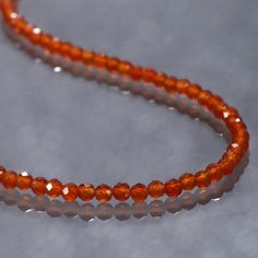 Carnelian faceted Beads Roundel Carnelian Beads Necklace 1 StrandStone Dimension : 2.5-3 MMStone Treatment: NaturalStone shape :Faceted RoundNecklace Length: 50 CmsNecklace Carat Weight : 34 (Approx)Silver Carat Weight: 3.8*Free Mystery Gift With Any Purchase to First 50 Customers....Happy Shopping Black Spinel Bracelet, Spinel Jewelry, Keshi Pearl Necklace, Faceted Bead Necklace, Carnelian Necklace, Turquoise Bead Necklaces, Gemstone Beaded Necklace, Party Necklace, Round Necklace