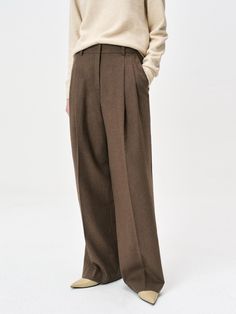 These bestselling pleated wide-leg pants from READYFI combine luxurious 60% wool blend construction with sophisticated tailoring for an effortlessly polished look. The versatile design features classic details including belt loops, diagonal front pockets, and decorative back welt pockets, while the full lining above the knee ensures comfort and structure. Available in brown, charcoal, and black colorways, these pants provide excellent warmth and styling versatility from fall through winter.Color Wide Leg Wool Pants, Pants Brown, Winter Color, Wool Pants, Wide Pants, Polished Look, Above The Knee, Welt Pockets, Welt Pocket