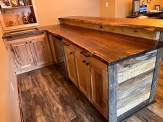 a wooden counter top sitting inside of a kitchen