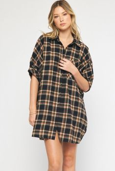 Oversized short sleeve button down flannel dress featuring pocket at bust. Unlined. Woven. Non-sheer. Lightweight. Trendy Short Sleeve Shirt Dress With Pockets, Trendy Cotton Short Sleeve Shirt Dress, Rolled Short Sleeve Shirt Dress For Day Out, Casual Short Sleeve Shirt Dress With Rolled Sleeves, Trendy Short Sleeve Shirt Dress For Work, Plaid Shirt Dress With Button Closure For Daywear, Trendy Short Sleeve Shirt Dress For Daywear, Trendy Short Sleeve Shirt Dress For Day Out, Short Sleeve Shirt Dress With Pockets For Fall