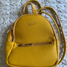 Brand New With Wrap Still Intact. Beautiful Citrine Yellow That Can Be Used Both As A Mini Daypack Or A Shoulder/Crossbody Bag With Interchangeable Straps And Clasps Backpack Bag, Forever Young, Mini Backpack, Mini Bags, Gold Yellow, Backpack Bags, Mini Bag, Citrine, Crossbody Bag