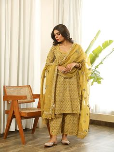 Beautiful handblock printed straight kurta pants set in pure cotton with lovely matching cotton doriya dupatta that is rightly finished with small floral motifs. Color: Yellow Fabric: Kurta & Bottom - Cotton Dupatta -Kota Doria Note: Length and sizes can be customised Length - Kurta 40 inches Pants 38 inches Available in other colors If you happen to see some deformity in hand-work or fabric, that’s mere the technique of the same and not a defect. The garment is quite premium. The product will b Gulabo Jaipur, Palazzo Kurta, Kurta Pants, Block Printed Suits, Kurta Palazzo Set, Reception Bride, Party Reception