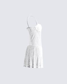 Give em' a taste of heaven in this white lace pleated dress 🤍 Made from stretchy lace, and complete with a lined bandeau bra, pleated skirt, fitted bodice, and drop waist that creates an elegant, and flowy look ✨ Leave little to the imagination -- dress is sheer & undergarments are not included 👀 Lace Dresses With Built-in Bra And Fitted Bodice, Strapless Fitted Lace Dress, Fitted Strapless Lace Dress, Fitted Lace Mini Dress With Built-in Bra, Flirty White Dress With Built-in Bra, Strapless Lace Dress In Coquette Style, Lace Mini Dress With Spaghetti Straps, Strapless Lace Coquette Dress, Coquette Strapless Lace Dress