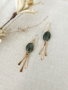 All Designs, Copyright © 2017 Nox Jewelry  The Starla earrings are made from your choice  14k Gold Filled or Sterling Silver. Each earring is paired with your choice of gemstone: lapis, labradorite, chrysoprase, iolite or kyanite. Metal fringe ( cut to shape and hammered  tips) is added giving this earring beautiful movement.  - 14k gold filled or Sterling silver Ear Wires  - Choice of gemstone: lapis, labradorite, chrysoprase, iolite or kyanite - Approx Size: 2.5" Long ( at its longest point) 1 Gemstone Earring Ideas, Fall 2024 Fashion Trends Jewelry, Unique Jewelry Photography, Dainty Beaded Earrings, Earring Photography Styling, Jewelry Inspo Aesthetic, Metal Fringe Earrings, How To Solder Jewelry, Diy Gold Jewelry