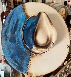 Artistic Short Brim Hat For Rodeo, Blue Wide Brim Country Style Felt Hat, Country Style Blue Wide Brim Felt Hat, Blue Country Style Felt Hat For Country Events, Blue Western Fedora With Wide Brim, Blue Brimmed Felt Hat For Country Events, Artistic Flat Brim Hat For Rodeo, Blue Western Wide Brim Fedora, Artistic Adjustable Blue Hat