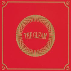 the glam album cover with an orange and yellow circle on it's red background