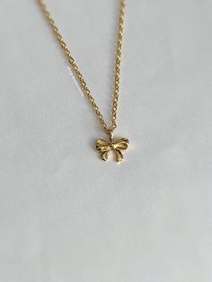 A sweet golden necklace that's so stunning on and matches everything. An absolute essential in every jewelry collection. Our chains are 100% stainless steel and hypoallergenic so they won't rust, tarnish, or turn your neck green. - Water resistant - Lobster clasp closure - Stainless steel chain + pendant - Select desired size at checkout Gold Clavicle Chain Charm Necklace As Gift, Hypoallergenic Gold Plated Charm Necklaces As Gift, Hypoallergenic Gold Plated Charm Necklace For Gift, Dainty Charm Necklaces For Gifts, Dainty Charm Necklace For Gift, Hypoallergenic Gold Plated Necklace For Gift, Adjustable Gold Charm Necklace For Gifting, Adjustable Gold Charm Necklace For Gifts, Adjustable Gold Charm Necklace As A Gift