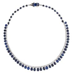 Natural Sapphire Burmese No heat and Diamond on white gold Necklace. Total Sapphire weight: estimated to be 41.10 carats. Total Diamond weight: estimated to be 5.17 carats. According to the Ssef Swiss Laboratory Report 122750, the 68 sapphires are natural non heated of Burmese origin. Classic Platinum Gemstone Necklace, Classic Platinum Necklace With Gemstone, Classic Platinum Gemstone Necklaces, Classic Sapphire Diamond Necklace For Formal Occasions, Formal Sapphire Necklace With Single Cut Diamonds, Classic Sapphire Necklace For Formal Occasions, Classic Formal Sapphire Diamond Necklace, Formal White Gold Tennis Necklace With Gemstone, Luxury Sapphire Necklace In Prong Setting