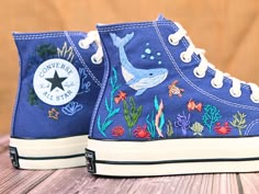 " Custom Embroidered Converse, Whale and Turtle Embroidered Shoes, Ocean Vibes Embroidered Sneakers Custom, Gifts for Divers "   CONVERSE ∙ EMBROIDERED ∙ OCEAN VIBES * Material: High-quality premium cotton embroidery thread, colorfast * Dimensions: Tailored to your selected US shoe size * Finish: High-end embroidery ∙ Sharp threading ∙ Colorfast * All shoes are custom-made by hand with Love and Care in our workshop ♡ 🎁 UNIQUE POINTS 🎁 Includes 1 pair of socks Free custom name or personal information Bright, colorfast embroidery thread, meticulously stitched OUR RETURNS AND REFUND POLICY We take full responsibility for any errors in design or execution on our part. If you wish to return your order for personal reasons, please note that you will need to cover the shipping cost. ADDITIONAL Embroidered Vans With Cactus, Cute Shoes Coners, Spiderman Shoes Converse Embroidered, Converse Like Sneakers, Cheap Custom Converse, Book Custom Converse, Nike Embroidered Shoes, Cool Converse High Tops With Fun Treatments, Custom Converse Shoes Low