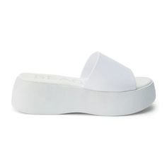 Vegan, single-band jelly platform sandal. Details: Synthetic upper Manmade outsole 2 in / 5.1 cm heel height 1 in / 2.54 cm platform Unlined Padded insole Slip-on style Imported Trendy White Synthetic Platform Slippers, Synthetic Wedge Sandals With Translucent Outsole And Round Toe, Summer Slip-on Slides With Translucent Outsole, White Plastic Jelly Sandals For Spring, Spring White Plastic Jelly Sandals, Modern Platform Jelly Sandals In Synthetic, Modern Platform Jelly Sandals In Synthetic Material, Flat Platform Jelly Sandals, Platform Jelly Sandals With Open Toe