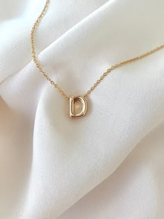 **Each piece in my shop, I personally create and photograph. (All photos are property of The Cord Gallery LLC) Thank you for supporting my small business. Tiny Gold Initial Necklace -  Gold Filled Now all Gold Filled - Waterproof! Add a personal touch to your accessories collection with this Dainty Gold Initial Necklace!  Features a 18k Gold Filled Mini Initial Letter. Each letter is 3D for added interest and texture and hangs seamlessly on your choice of Gold Filled Link or Gold Filled Box chai Necklace Initial Letter D, How To Photograph Necklaces, Wishlist Summer, Letter Necklace Initials, Letter Charm Necklace, Gold Initial Necklace, Dainty Initial Necklace, Letter Pendant Necklace, Initial Necklace Gold