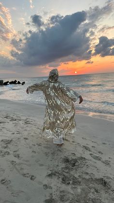 Burningman Outfit, Sparkly Kimono, Golden Outfit, Gold Sequin Kimono, Gold Caftan, Sequin Kimono, Sequin Duster, Party Outfit, Burner jacket  Bohemian Sun Catcher Kimono 🤍💿 Goldish Mirror like shell sequins duster with a hood 🪐🌪          ⚡️💥Want 3 days fast shipping? There is an option at the check out!☄️ 🪐 Crafted with very Bright Light Gold Sequins on Beige fabric. It is not a tacky gold instead it is a very classy hue of gold. Shell Shaped sequins are embroidered in tribal ethnical patt Golden Outfit, Sequin Duster, Bohemian Sun, Custom Bras, Sequin Cape, Sequin Kimono, Edc Outfits, All White Outfit, Sequin Jacket