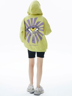 Make a bold statement with our Lime Green Graphic Zip Hoodie. This eye-catching sweatshirt features a vibrant lime green base with contrasting purple text across the chest. The playful typography design includes quirky eye graphics, adding a unique touch. With a comfortable fit, full-zip front, and kangaroo pockets, this hoodie combines style and practicality. Perfect for those who love standout streetwear with a fun twist, it's ideal for casual outings or lounging in style. The hoodie's bright Green Hooded Sweatshirt With Logo Print, Urban Green Sweatshirt With Letter Print, Green Logo Print Sweatshirt For Spring, Trendy Purple Hoodie With Graphic Print, Green Hooded Hoodie With Graphic Print, Green Graphic Print Hooded Hoodie, Green Letter Print Hoodie, Trendy Green Hoodie Top, Green Slogan Sweatshirt For Streetwear