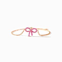 This elegant simple pink pave bow bracelet, like the first cherry blossom in the morning, gently swaying in the heart, telling the endless tenderness and elegance. Each selected powder crystal bead on the pink bow bracelet contains a delicate luster. And the pink bow in the center is not only a symbol of sweetness, but also with a silk of sweetness and romance, making people intoxicated.Material: 925 SilverPlating Color: Rose Gold Pink Ribbon Jewelry As Gift, Pink Ribbon Jewelry Gift, Pink Ribbon Jewelry For Gifts, Pink Party Jewelry With Butterfly Knot Detail, Pink Party Jewelry With Butterfly Knot, Pink Ribbon Wedding Jewelry, Pink Bow Jewelry Gift, Feminine Adjustable Ribbon Jewelry, Elegant Adjustable Pink Bracelet