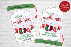 two christmas gift tags with stockings and mittens hanging from the front, on a white brick wall