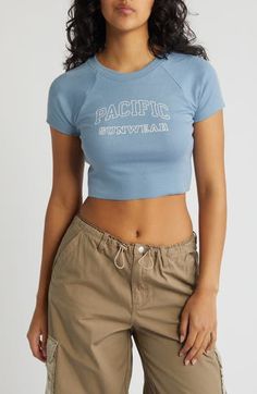 Raglan sleeves bring a sporty vibe to a logo-stamped crop top cut from soft, stretchy jersey. 16" length (size Medium) Crewneck Short sleeves 95% cotton, 5% spandex Machine wash, tumble dry Imported Pacsun Logo, Crop T Shirt, Crop Tshirt, Baby Tee, Pacsun, Infant Tees, Raglan Sleeve, Crop Top, Tee Shirts