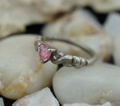 This is the perfect option for those who like cool, unique jewelry and the luxury, shine of silver, pink. This ring is well made, cute and/or elegant in design, and very desirable. The ring is decorated with cz on the top. The shape of the top is triangle. ♥ There is a hallmark: Sterling. 925 ♥The size of the ring is 3 1/4. This piece is from estate where all the jewelry was from USSR. It is very old and collectible piece. This item is pre-owned vintage and may show some wear commensurate with i Silver Pink Sapphire Rings For Gift, Silver Pink Sapphire Ring As Gift, Nickel Free Pink Promise Ring, Unique Pink Promise Ring, Elegant Nickel-free Pink Ring, Nickel-free Pink Rings For Weddings, Trillion Cut Pink Jewelry For Anniversary, Pink Trillion Cut Jewelry For Anniversary, Nickel-free Pink Rings For Gifts