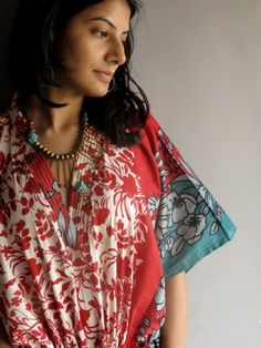 I made this Kaftan from a beautiful Red floral 100% mulmul cotton. Mulmul is a very fine variety of cotton which is extremely soft and it gets softer with every wash. It is so free flowing, that it will make you feel as if you aren't wearing anything at all ;) The beauty of the Kaftans is they will fit everyone so no need to worry about the size et all. All my Kaftans have deep necks(11-12 inches) so will fit all head sizes. However, the length of my kaftans will vary. It is 53 inches long and i Hostess Gown, Vintage Style Dresses, Free Flowing, 70s Inspired, Red Floral, Red Green, Floral Tops, Kimono Top, Cover Up