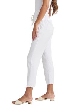 Keep it light and breezy in these drawstring-waist pants crafted with handy pockets and straight legs. 27" inseam, 14" leg opening, 12" front rise, 15" back rise (size Medium) 73% viscose, 27% lyocell Machine wash, tumble dry Imported White Drawstring Ankle-length Bottoms, Relaxed White Pants For Day Out, Relaxed Cropped Leg Bottoms For Spring, Summer Pants With Drawstring For Everyday Wear, Relaxed White Ankle-length Bottoms, Relaxed Ankle-length White Bottoms, Relaxed White Ankle-length Pants, White Relaxed Ankle-length Pants, Everyday Spring Bottoms With Drawstring