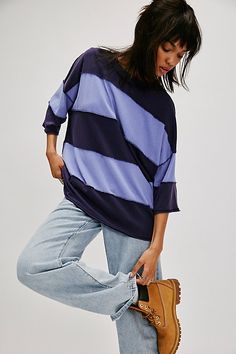 A modern take on a wardrobe staple, this easy tee from We The Free is featured in an oversized style with wide stripes and exposed seams. **Fit:** Relaxed, oversized **Features:** Comfy cotton fabrication, classic crew neckline, drop-shoulder short sleeves, wide stripes, exposed seams **Why We | We The Free Maddie Tee at Free People in Blue, Size: S Oversized Top With Striped Hem, Oversized Tops With Striped Hem For Spring, Oversized Spring Top With Striped Hem, Spring Oversized Top With Striped Hem, Oversized Striped Hem Tops For Spring, Oversized Striped Top For Layering, Oversized Tops With Contrast Stripes For Layering, Oversized Trendy Top With Contrast Stripes, Trendy Oversized Top With Contrast Stripes