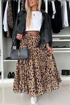 Long Leopard Print Skirt For Spring, Leopard Print Long Skirt For Spring, Casual Leopard Print Skirt For Fall, Casual Leopard Print Midi Skirt, Casual Leopard Print Midi Skirt Bottoms, Spring Leopard Print Midi Skirt, Trendy Leopard Print Lined Skirt, Leopard Print Flowy Long Skirt, Casual Leopard Print Flowy Skirt