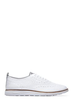 A pair of comfy, knit upper sneakers matches with anything in your closet for a sporty chic look. Sizing: True to size. B=standard width. Round toe. Wingtip and brogue detail. Lace-up closure. Back pull-tab. Removable padded insole. White sole. Imported Casual Wingtip Lace-up Shoes With Textured Sole, Oxford Lace-up Shoes With Textured Sole, Spring Derby Wingtip Lace-up Shoes, Casual Oxford Wingtip Lace-up Shoes, Casual Wingtip Oxford Lace-up Shoes, White Wingtip Lace-up Casual Shoes, Casual Oxford-style Lace-up Wingtip Shoes, Casual Summer Wingtip Lace-up Shoes, Elegant Low-top Lace-up Shoes With Perforated Toe Box