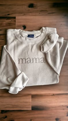 Time to get comfy! This embroidered sweatshirt will be your new favorite with the embroidered mama font in a warm neutral to match the sweatshirt.  -Sizes available: Adult Small - Adult 2XL  -Fit: oversized -Material: 100% cotton, corded fabric  -Machine embroidered  -design centered on chest Relaxed Fit Top With Embroidered Logo, Relaxed Fit Top With Embroidered Logo For Loungewear, Long Sleeve Tops With Embroidered Logo For Loungewear, Oversized Embroidered Tops For Loungewear, Embroidered Oversized Tops For Loungewear, Cotton Tops With Embroidered Logo For Loungewear, Casual Sweatshirt With Custom Embroidery For Loungewear, Fall Sweater With Embroidered Logo For Loungewear, Long Sleeve Tops With Custom Embroidery For Everyday