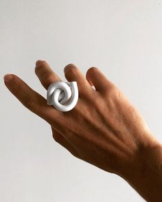 "The Cloud Knot Ring is a collection of contemporary acrylic design inspired by its symbolism of love, connection and binding. It also symbolizes peace, unity, protection and liberation. I made this ring while listening to the song \"I want to break free\" from the album The Works by Queen. The song is a symbolism of the fight against oppression and women's liberation movement. Each piece is unique allowing for collectors to style themselves with contemporary wearable design. 100% Acrylic | Hand I Want To Break Free, Clear Bracelet, Orange Ring, Acrylic Bracelet, Lucite Bracelets, Knot Bangle, Birthday Gift Photo, Wearables Design, Acrylic Ring