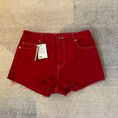 A Pair Of Bright Red No-Stretch Denim Shorts With White Contrast Stitching. Parisian Jeans, Embroidered Denim Shorts, Black Mom Jeans, Red Denim, Short Jean, Cuffed Denim Shorts, Stretch Denim Shorts, Black Jean Shorts, Cutoff Shorts