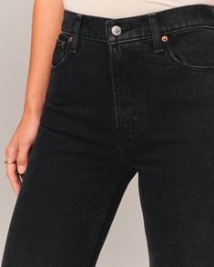 On-trend 90's-style high rise relaxed jeans, that are slim at the top with a wider leg shape, featuring a full-length leg, black wash and clean hem. Spring Black Flare Jeans In Rigid Denim, Classic Black Cropped Jeans With Straight Hem, Classic High Rise Black Jeans, High Rise Washed Black Jeans, High Rise Washed Black Cargo Jeans, Black High Rise Cropped Jeans, Classic Black Mid-rise Cropped Jeans, Black Jeans With Straight Hem For Fall, High Rise Washed Black Flare Jeans