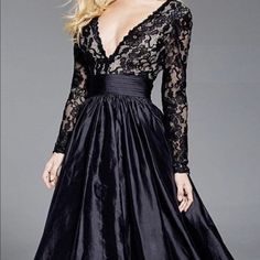 A Beautiful Ball Gown With Lace Bodice And Sleeves. Worn For Talent Performances. Black A-line Wedding Gown, Black A-line Gown For Formal Occasions, Black Ball Gown For Party, Black A-line Evening Dress For Gala, Black A-line Ball Gown For Formal Events, Black Ball Gown With Fitted Bodice For Party, Elegant Black A-line Ball Gown, Black V-neck Gown With Sweep Train, Evening Dress With Lace Sleeves And Fitted Bodice