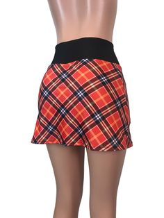 Step up your game in this fun and colorful athletic skirt with built in compression shorts and pocket. This golf, tennis, running or sports skirt is slim-style, but allows for plenty of movement, made of a red plaid high quality performance spandex. The compression shorts are uniquely designed to be incredibly comfortable and won't ride up during activity. The pocket is positioned on the side of the shorts, and will fit your phone, keys, ID, etc. *Please see size chart in images above for standa Running Skirt, Sports Skirt, Athletic Skirts, Running Skirts, Golf Skirt, Slim Skirt, Athletic Skirt, Slim Style, Tennis Skort