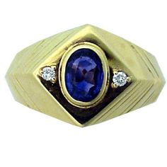 This estate lovely ring made in 14K yellow gold. This well crafted ring, showcases central oval 1.09 ct. sapphire accented by 2 diamonds (DTW is appro. 0.06ct.). Total weight is 7.85 gr. This gorgeous ring will attract admiration every time it is worn and is the perfect addition to any jewelry collection. Yellow Gold Sapphire Ring With Diamond Oval Cabochon, Yellow Gold Sapphire Diamond Ring With Oval Cabochon, Oval Cabochon Sapphire Ring In Yellow Gold With Diamond, Timeless Oval Sapphire Ring Stamped 14k, Timeless 14k Stamped Oval Sapphire Ring, Formal Oval Sapphire Ring Stamped 14k, Oval Sapphire Ring Stamped 14k For Formal Occasions, Formal Oval Sapphire Signet Ring, Classic Oval Sapphire Ring With Diamond Accents