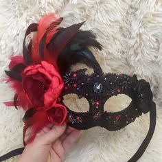 Masquerade mask in black, red and burgundy colors. The carnival mask is decorated with glass rhinestones, high-quality lace, feathers and hand-beaded lace elements. The main decoration is satin flowers with centers made of beads, rhinestones and sequins. This mask is perfect for Masquerade Ball, Carnival Party, Masquerade Wedding, Mardi Gras, Bridal Shower, Stylized Photo Shoot Dark Red Masquerade Mask, Gothic Masks For Mardi Gras Theater, Gothic Masks For Theater And Mardi Gras, Gothic Masquerade Eye Mask For Theater, Gothic Eye Mask For Theater Masquerade, Gothic Eye Mask For Theater, Elegant Red Masks For Carnival, Red Venetian Mask For Masquerade, Gothic Masquerade Eye Mask For Carnival