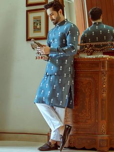 Blue Cotton Bandhgala For Eid, Embroidered Cotton Bandhgala In Blue, Embroidered Blue Cotton Bandhgala, Festive Blue Cotton Bandhgala, Cotton Long Sleeve Outerwear For Eid, Long Sleeve Cotton Outerwear For Eid, Cotton Nehru Jacket With Dabka And Long Sleeves, Long Sleeve Cotton Nehru Jacket With Dabka Detailing, Long Sleeve Cotton Nehru Jacket With Dabka