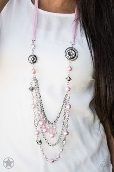 A silky pink ribbon replaces a traditional chain to give an elegant look. Pearly pastel pink beads and funky silver pieces intermix with varying lengths of silver chains to give a fresh take on a Victorian-inspired piece.

Sold as one individual necklace. Includes one pair of matching earrings. Long Pink Necklace For Parties, Pink Long Necklace For Party, Feminine Pink Pearl Chain Jewelry, Elegant Pink Chain Necklaces, Pink Metal Chain Necklace For Party, Trendy Pink Beaded Chain Jewelry, Elegant Pink Metal Chain Necklace, Pink Adjustable Multi-strand Necklace, Pink Metal Chain Necklace With Adjustable Chain