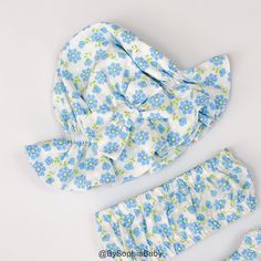 LIGHT BLUE FLORAL BLOOMER, TOP AND HAT SET - This listing is for a set of Bloomer, Top and Hat - Made of NON-STRETCHY 100% cotton fabrics that are comfortable to wear in trendy prints. Made with lots of attention to detail. - The Hat is very stretchy, it will be able to fit your baby head for a long time. - This set is perfect for Baby Sun Bath, Beach Day, Park Day, Photo shoot or Summer time! - Machine wash cold/gentle cycle, lay flat to dry & touch up with an iron. SHIPPING INFO: - FREE sh Cute Beach Bonnet One Size, Cute Beach Bonnet, Playful Blue Hats With Upf 50+, Blue Uv Protection Hats For Playtime, Blue Hats With Uv Protection For Playtime, Playful Blue Sun Hat For Playtime, Light Blue Sun Hat With Curved Brim For Beach, Playful Blue Hat With Uv Protection, Playful Blue Hats With Uv Protection